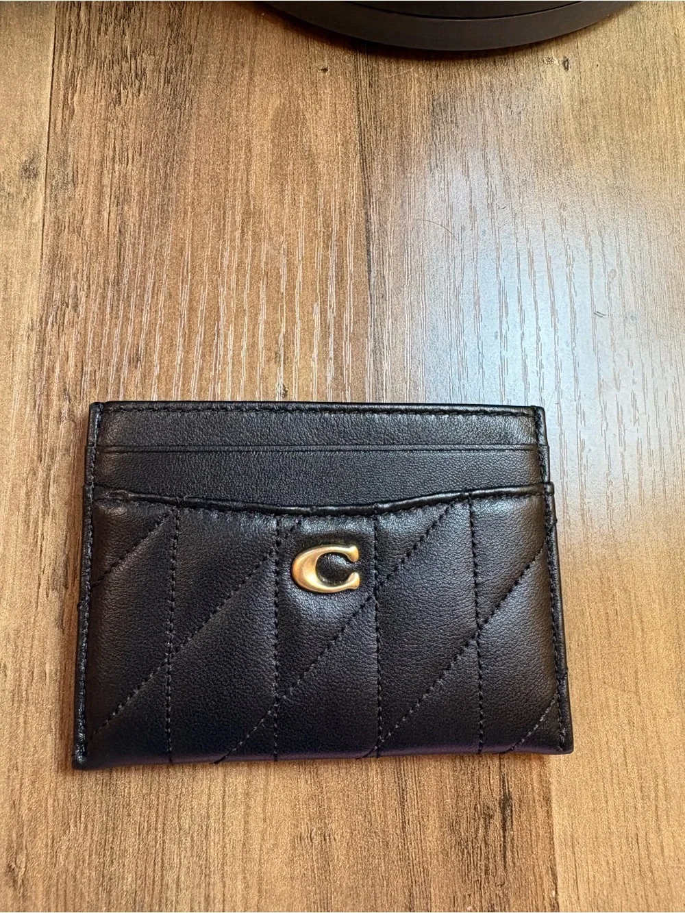 Coach quilted card holder black with brass hardware